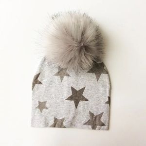 Brand new Baby/Toddler toque hat with pompom